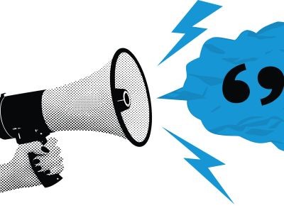 main tenant un haut parleur d'où sort des guillemets